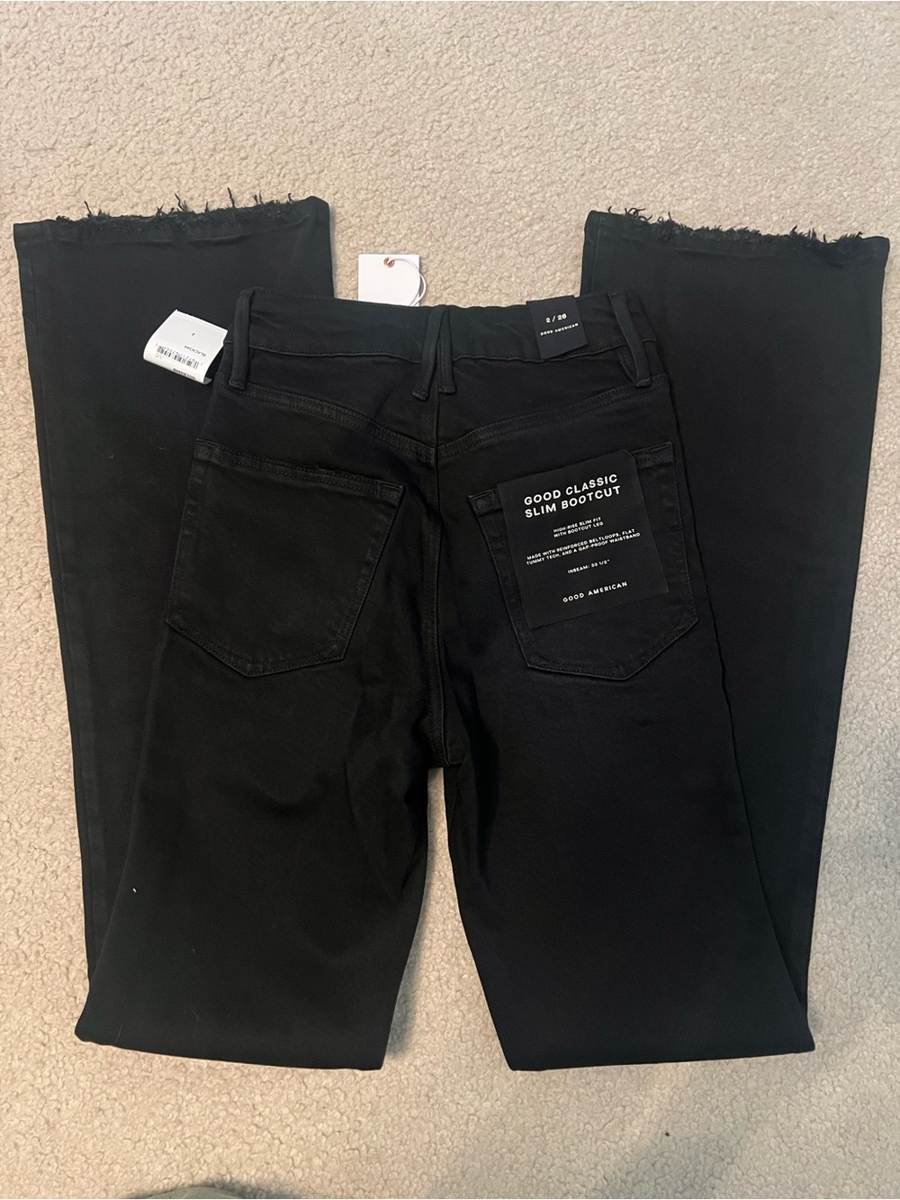 Good American Black Raw Hem Slim Bootcut Jeans
